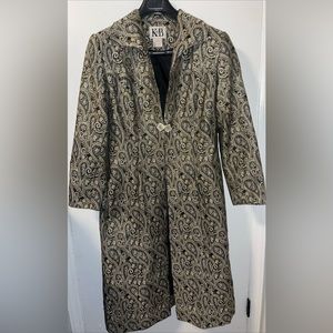 Stella Louise for KB Gold printed suit with black background.